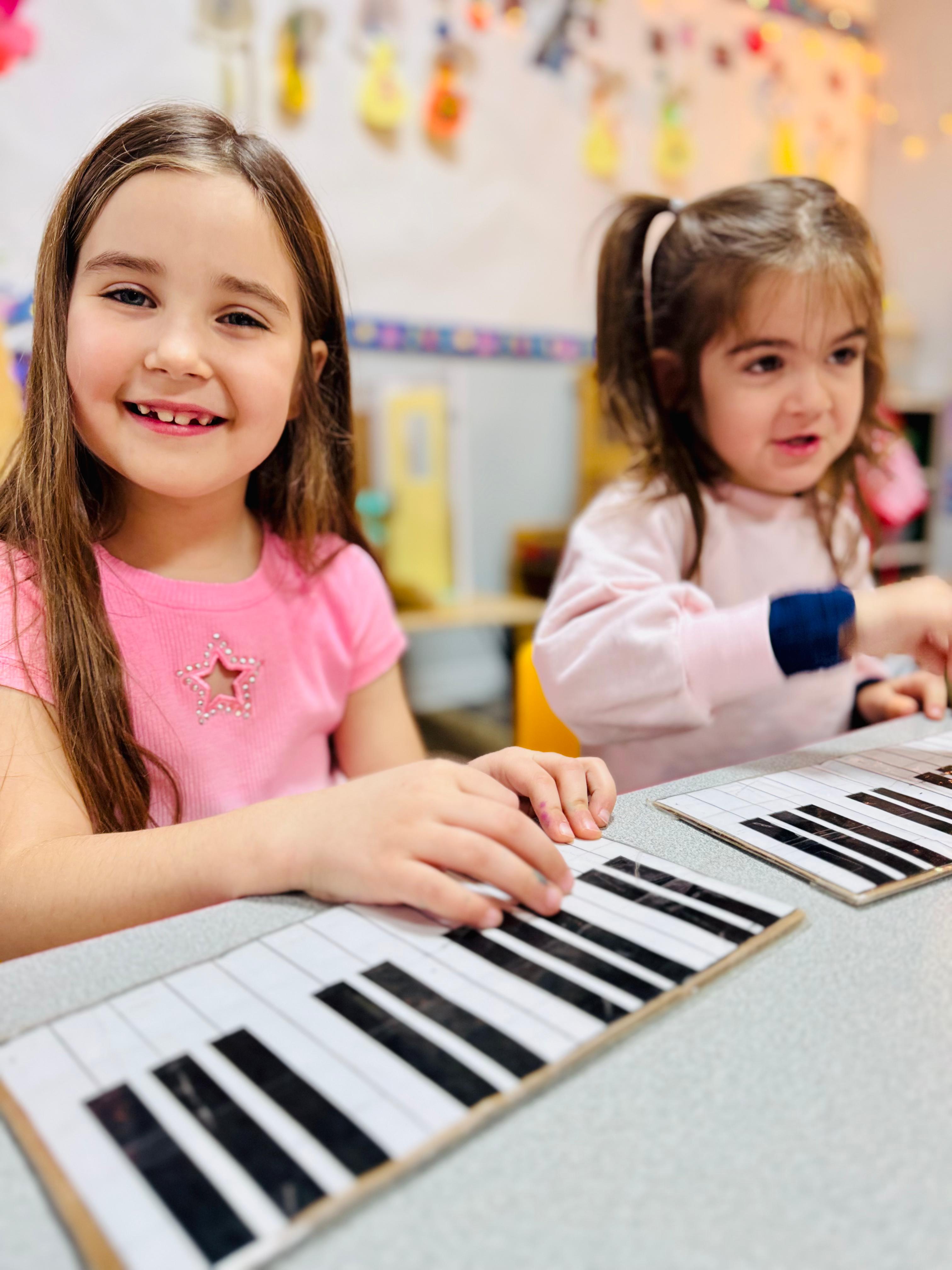 Children enjoying music activities in a bright classroom